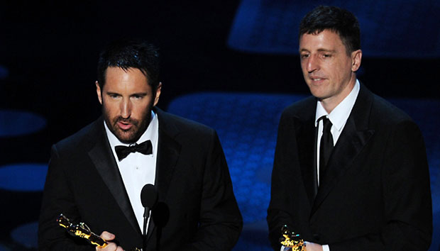 The Social Network composers Trent Reznor and Atticus Ross accept the Oscar for best Original Score at the 83rd Academy Awards.