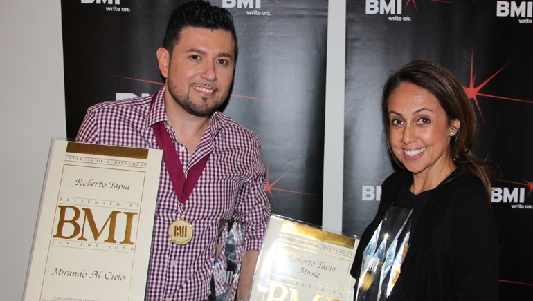 Pictured at BMI’s Los Angeles office are: BMI songwriter and recording artist Roberto Tapia and BMI’s Delia Orjuela.