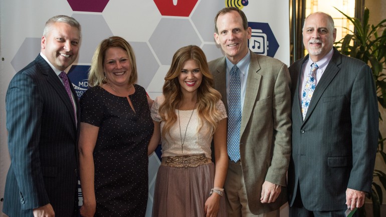 Pictured (L-R) after the performance are: WBAL-TV President/GM and MDCD Board Chair Dan Joerres, MDCD Executive Director Lisa Reynolds, BMI singer-songwriter Ruthie Collins, BMI’s Dan Spears and WXCY-FM General Manager Bob Bloom.