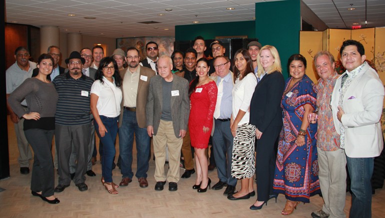 Members of Nashville’s Latin Community and the BMI team pause during the meet and greet for a group shot.