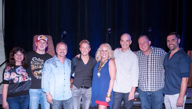 Pictured before the performance are: BMI’s Jessica Frost, BMI songwriters Travis Denning and Frank Myers, Billy Gilman, RIHA President and CEO Dale Venturini and BMI songwriters George Teren, Phillip White, and Jared Mullins.