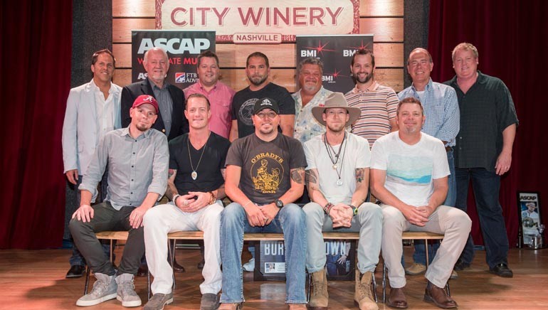 Pictured (L-R): The people involved with Jason Aldean’s hit “Burnin’ It Down” (back row): BBR Music Group’s Jon Loba and Benny Brown, BMI’s Bradley Collins, producer Michael Knox, Big Loud Shirt’s Craig Wiseman and Matt Turner, Round Hill’s Mark Brown and ASCAP’s Mike Sistad. (Front row): songwriter Chris Tompkins, BMI songwriter Tyler Hubbard, BMI affiliate Jason Aldean, BMI songwriters Brian Kelley and Rodney Clawson.
