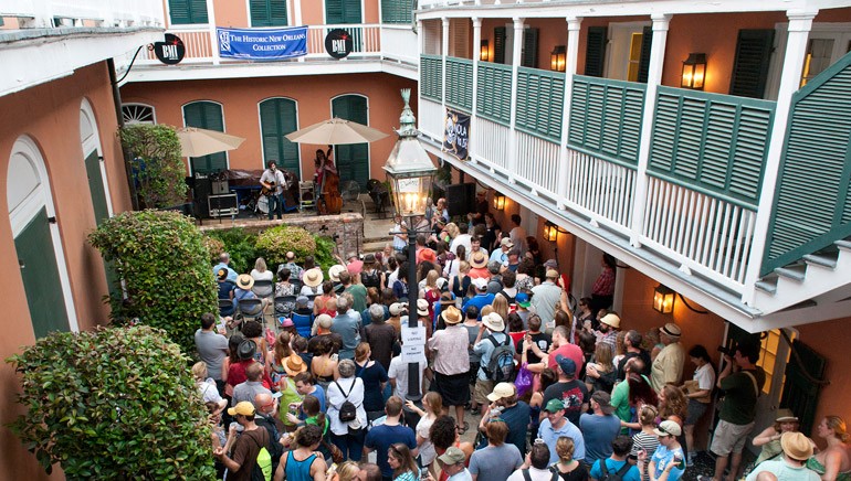 The crowd fills the courtyard at The Historic New Orleans Collection, a museum, research center and publisher focusing on the rich history of New Orleans.