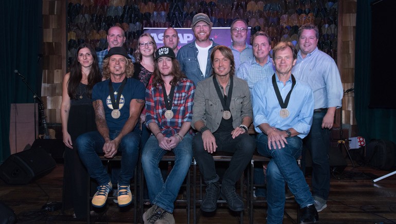 Pictured: (L-R): (Back Row) 3 Ring Circus’ Casey LeVasseur and Darrell Franklin, Sony/ATV’s Abbey Adams, ASCAP’s Robert Filhart, producer Nathan Chapman, Universal’s Mike Dungan, BMI’s Jody Williams and Bradley Collins. (Front Row) BMI songwriter Jeffrey Steele, songwriter Jaren Johnston, BMI affiliate Keith Urban, BMI songwriter Tom Douglas.