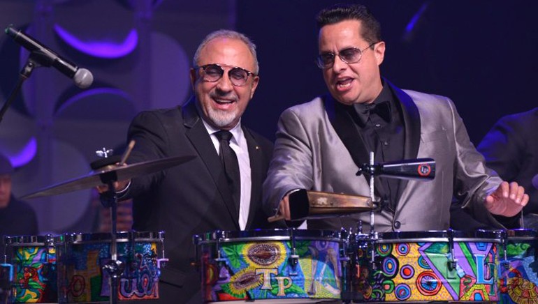 Emilio Estefan joins Tito Puente Jr. onstage at the Latin Songwriters Hall of Fame’s 4th Annual 2016 La Musa Awards.