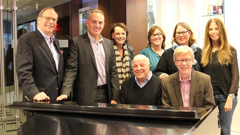 BMI’s Charlie Feldman and Mike O’Neill, Joan Fox and BMI’s  Ann Sweeney, Alison Smith, Brooke Morrow and Patrick Cook pose for a photo during BMI composer Charlie Fox’s visit to the New York office.