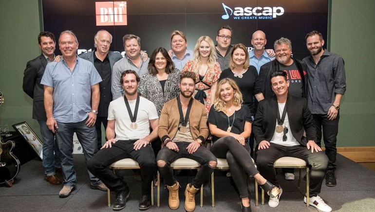 Pictured L-R: (back row) ASCAP’s Michael Martin, Round Hill Music’s Mark Brown, Big Yellow Dog’s Kerry O’Neil, BMI’s Bradley Collins, Big Yellow Dog’s Carla Wallace, BMI’s David Preston, ASCAP’s Beth Brinker, Big Loud Records’ Joey Moi, Major Bob's Music’s Tina Crawford, Big Loud Records’ Clay Hunnicut, Craig Wiseman and Seth England. (front row) Songwriter Abe Stoklasa, BMI artist Chris Lane and BMI songwriters Sarah Buxton and Jesse Erasure.