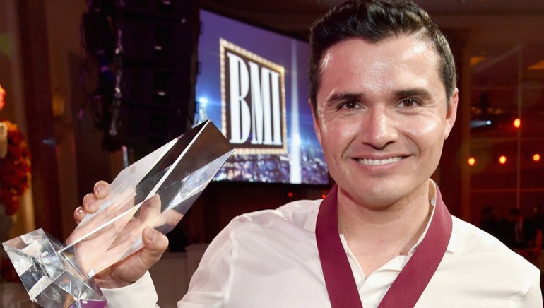 Honoree Horacio Palencia poses with his awards onstage during the 2016 BMI Latin Awards on March 2, 2016 in Beverly Hills, California.