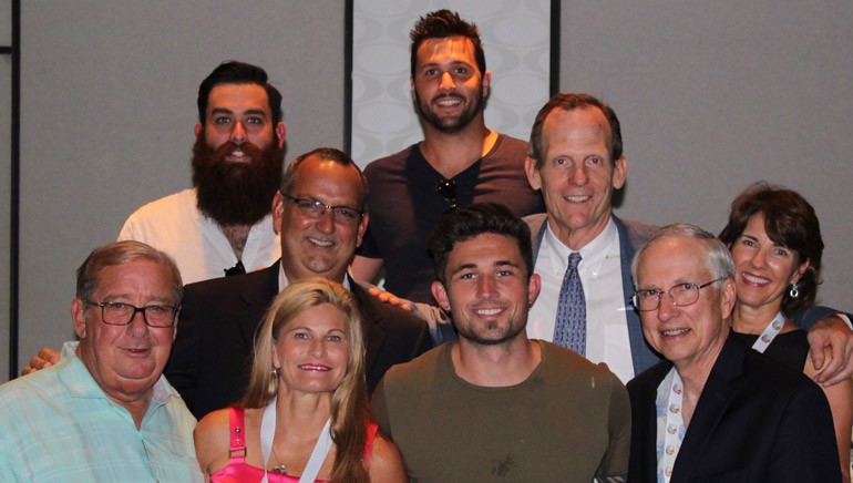 Pictured (L-R) after the performance are (top row): guitarist Kurt Ozan and tour manager Andrew Beselica. (middle row): Univision Communications Senior Vice President and FAB Board Chair Luis Fernandez- Rocha, BMI's Dan Spears and the Mesnik Group’s Denise Mesnik. (front row): FAB President and CEO Pat Roberts, iHeart Media Regional Vice President and FAB Immediate Past Board Chair Sherri Griswold Holladay, BMI songwriter Michael Ray and Hall Communications President Art Rowbotham.