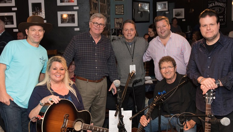 Pictured: (L-R): Standing:  BMI songwriter Scotty Emerick, BMI’s Phil Graham, Jody Williams and Bradley Collins, BMI songwriter Bobby Tomberlin. Seated: BMI songwriters Leslie Satcher and Mac Davis.