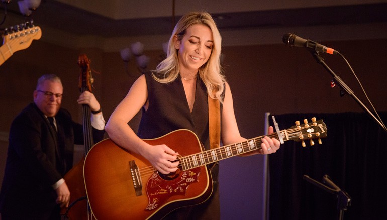 BMI songwriter Ashley Monroe strums her guitar at one of the songwriter-in-the-round events at Dean Dillon’s Mountain High Music Festival.