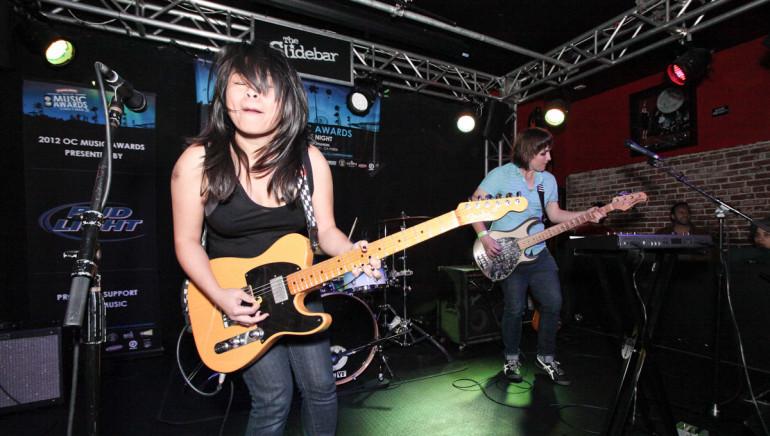 Pictured: Merilou Salazar and Jessie Meehan of Where She Is compete at the Best Live Band competition during the OC Music Awards.