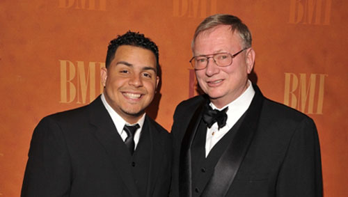 At the 2010 BMI Latin Awards in Las Vegas are 2010 BMI Peer Latin Scholarship recipient Samuel Genao and Mr. Ralph Peer II.