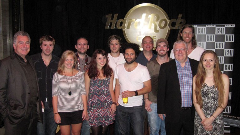 Seen in a group photo after the showcase are members of headlining band Melodime, and singer/songwriters Paul Masson, Rene Moffat and Molly Hagen, flanked by BMI Senior VPs Richard Conlon (left) and Fred Cannon (third from right).
