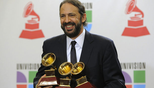 Juan Luis Guerra poses with his Latin Grammys at the 11th Annual Latin Grammy Awards on Thursday, Nov. 11, 2010, in Las Vegas.
