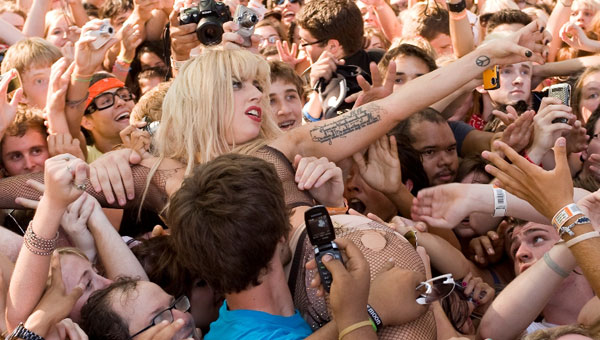 Lady Gaga surfs the crowd during Semi Precious Weapons’ performance on BMI’s Lollapalooza stage August 6 in Chicago.