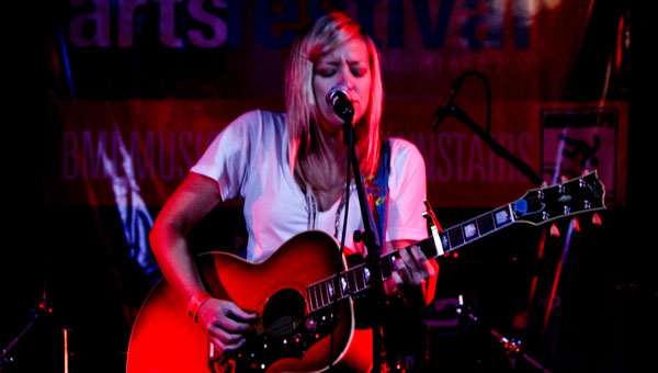 Amy Stroup offers a soulful performance in the BMI Music Café during the Kimball Arts Festival in Park City, Utah.