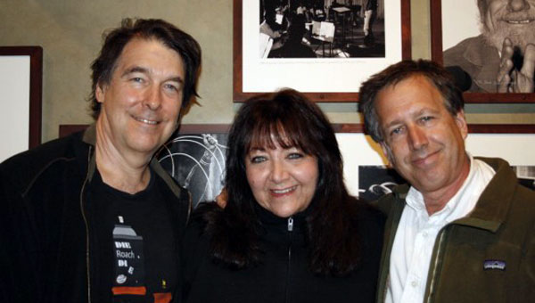 Award-winning composer and Lab advisor David Newman, Lab advisor Doreen Ringer Ross and Sundance Institute Film Music Program Director Peter Golub pause for a photo during the 2009 Sundance Composers Lab. The trio is standing in front of a shot that captures Newman conducting at the Lab in the 1980s. The 2009 session marked Newman’s first return to the Lab since he oversaw it from 1986 to 1989.