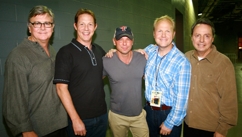 Pictured above at Texas Stadium during the Dallas stop on Chesney’s 2011 Going Coastal Tour are BMI’s Phil Graham and Clay Bradley, Kenny Chesney, Sony/ATV Music Publishing’s Troy Tomlinson, and BMI’s Jody Williams.