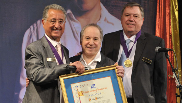 Pictured at the 2011 BMI Board of Directors dinner on April 12 during the NAB Convention in Las Vegas are (l-r): BMI President & CEO Del Bryant; BMI songwriter Paul Simon; and BMI Board Chair Jack Sander.