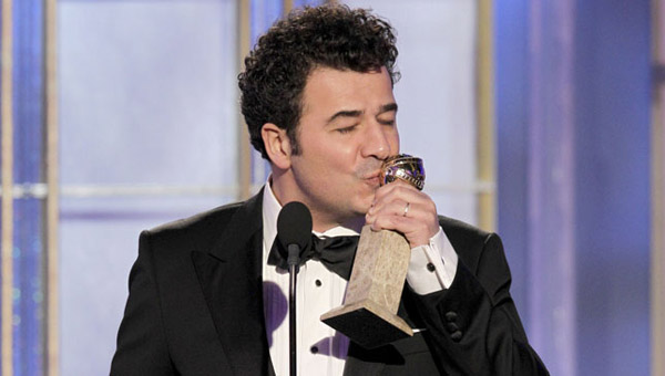 Pictured: Ludovic Bource celebrates his win for Best Original Score at the 2012 Golden Globes.