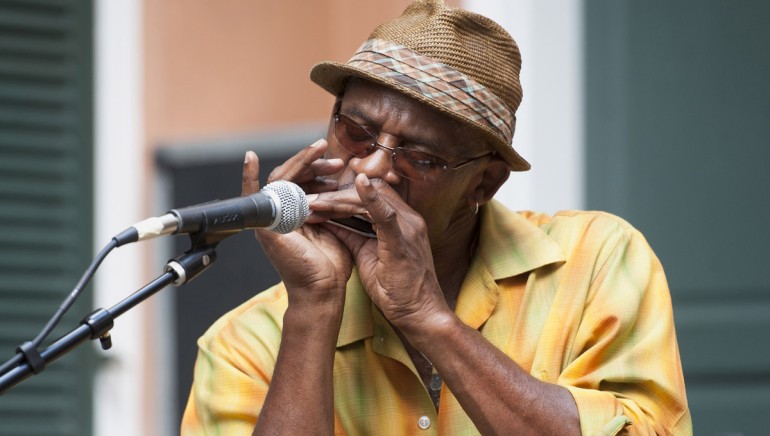 Ricky Weston performs with Colin Lake at the Historic New Orleans Collection during the French Quarter Festival.