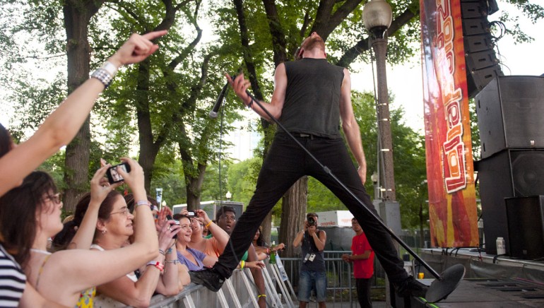 Sean Van Vleet of the band Empires strikes an unforgettable pose while performing on the BMI stage at Lollapalooza on August 5 in Chicago.