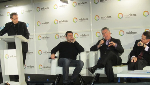 BMI’s Richard Conlon addresses the audience at the cloud music panel during midem 2012. Pictured are moderator Emmanuel Legrand, a journalist and consultant; Scott Bagby, head of strategic partnerships at Rdio; Richard Conlon, BMI Senior VP of Corporate Strategy, Communications & New Media; and SACEM VP Thierry Desurmont.