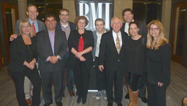 Pictured after the show L-R: Cox Media EVP Kim Guthrie, BMI’s Dan Spears, CBS Radio EVP Scott Herman, Barry Dean, Hubbard Radio Chair and BMI Board member Ginny Morris, Hunter Hayes, Cromwell Group President Bud Walters, Commonwealth Broadcasting President & CEO and BMI Board member Steve Newberry, Lori McKenna, RAB President & CEO Erica Farber.