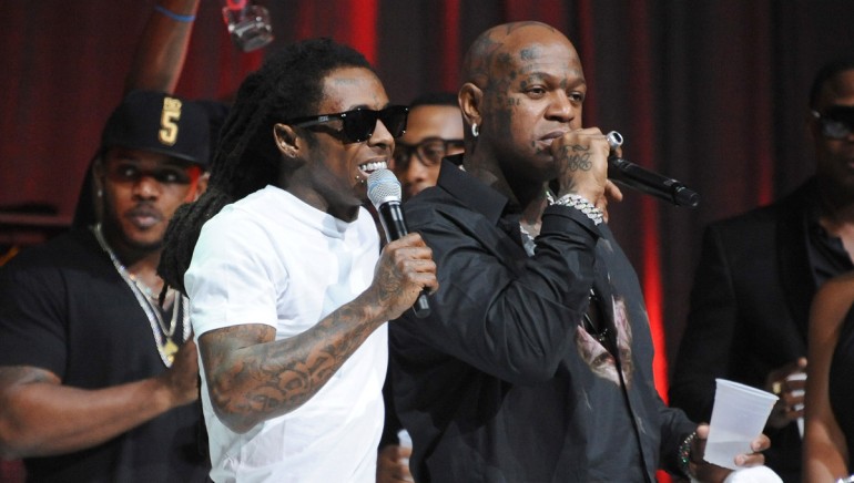 Lil Wayne and Birdman perform onstage at the 2013 BMI R&B/Hip-Hop Awards at Hammerstein Ballroom on August 22, 2013 in New York City.