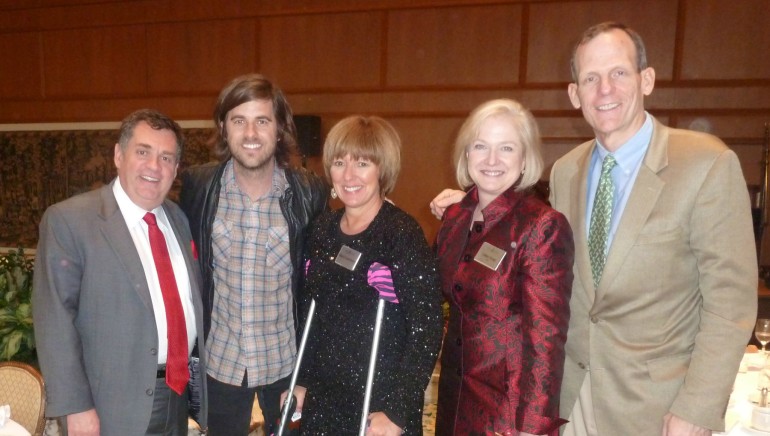 Pictured after his performance (left to right): Columbia Hospitality CEO John Oppenheimer, Graham Colton, Deanna Oppenheimer and former Fisher Communications President & CEO Colleen Brown.