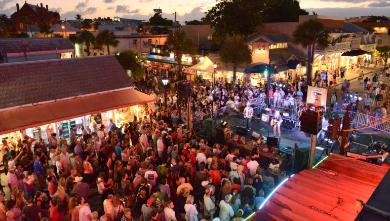 Pictured: Crowds fill Duval Street for Joanna Smith’s set during the 18th Annual Key West Songwriter’s Festival on Saturday, May 4, 2013.