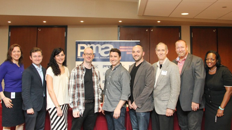 The panelists and BMI representatives behind