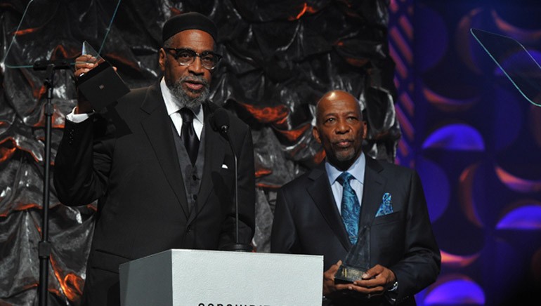 Legendary BMI songwriters Kenneth Gamble and Leon Huff accept the Johnny Mercer Award at the 2014 Songwriters Hall of Fame Gala.