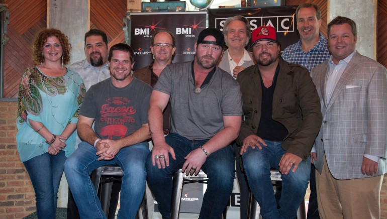 (L-R) (Front row): Rob Hatch, BMI songwriter Lee Brice, BMI songwriter Dallas Davidson (Back Row): Magic Mustang Music's Juli Newton-Griffith, SESAC’s Tim Fink, Mike Curb Music’s Drew Alexander, Curb Record's Mike Curb, EMI Blackwood’s Tom Luteran, BMI’s Bradley Collins