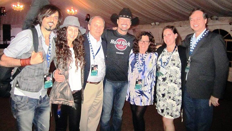Pictured (L-R) after the performance are: BMI songwriter Rick Caballo, Melissa Core, KBA Chairmen Rick McCue, BMI songwriter Jamie Lee Thurston, KBA Board Member Dawn Sciarrino, National Association of Broadcasters SVP Ann Bobeck and BMI’s Rick Schrock.