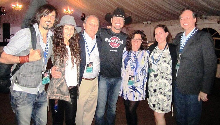 Pictured (L-R) after the performance are: BMI songwriter Rick Caballo, Melissa Core, KBA Chairmen Rick McCue, BMI songwriter Jamie Lee Thurston, KBA Board Member Dawn Sciarrino, National Association of Broadcasters SVP Ann Bobeck and BMI’s Rick Schrock.