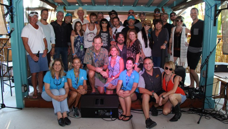 BMI’s Dan Spears and David Claassen with the Fort Myers Beach songwriters and the staffs from the VCB and iHeart Media/Cat Country 107.1.