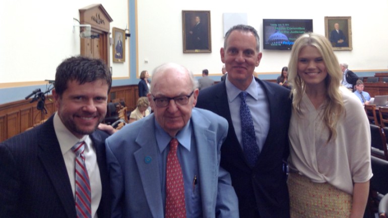 BMI songwriters Lee Thomas Miller (left) and Nicolle Galyon (right) pose with Michael O’Neill (second from right) and Chairman Coble (second from left) after the June 10 music licensing hearing.

