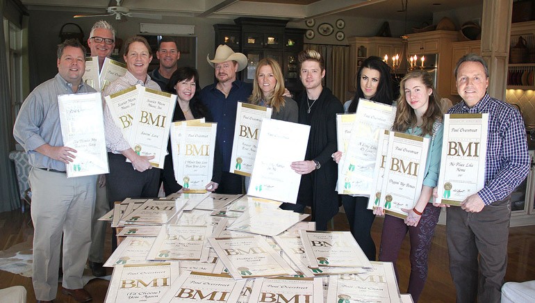 Pictured are BMI’s Bradley Collins, Perry Howard, Clay Bradley, and Mark Mason; Overstreet’s wife Julie Miller; Overstreet; BMI’s Leslie Roberts; Overstreet’s children Nash, Summer, and Charity; and BMI’s Jody Williams.