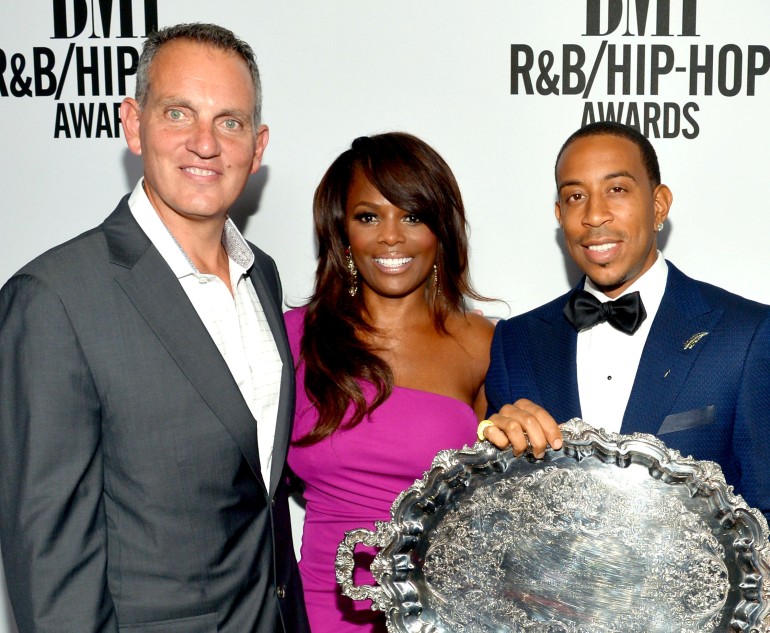 BMI President and CEO Michael O'Neill, BMI Vice President of Writer/Publisher Relations Catherine Brewton and honoree Chris 'Ludacris' Bridges (holding the BMI President's Award) attend the 2014 BMI R&B/Hip-Hop Awards at the Pantages Theatre on August 22, 2014 in Hollywood, California.