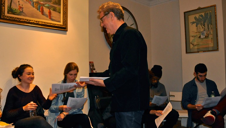 Instructor Billy Seidman hands out materials at his Song Arts Academy Workshop.