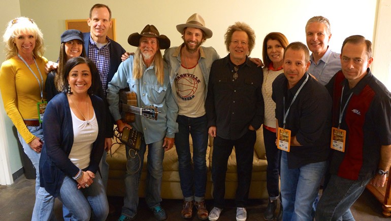 Pictured before the performance at the Depot (left to right): KSFI-FM/KRSP-FM/KSL-AM Director of Sales Stephanie Palmer, Bonneville-Salt Lake VP of Marketing Tami Ostmark, KSFI/KRSP Sales Manager Emily Hunt, BMI’s Dan Spears, Dean Dillon, Paul McDonald, Steve Dorff,  Bonneville’s Lisa Brown, KSFI/KRSP Director of Promotions Joey Roth, KSL Broadcast Group President Darrell Brown, KSFI/KRSP Brand Manager Kelly Hammer.