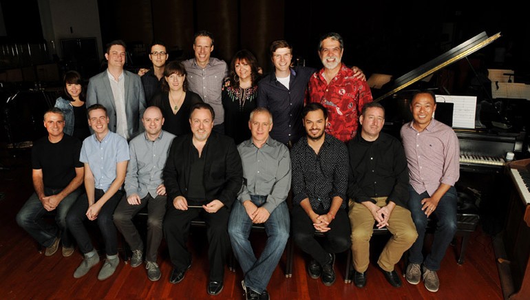 The team behind the 18th annual BMI conducting workshop series joins the program’s participants for a photo. Pictured (L-R standing) are: BMI’s Evelyn Rascon, participants Andrew Morgan Smith, Joel Richard, Heather McIntosh, John Kaefer, BMI’s Doreen Ringer-Ross, participant Josh Moshier and editor Chris Ledesma.(sitting): Participants Joseph DeBeasi and Michael Kramer, BMI’s Philip Shrut, instructor Lucas Richman, contractor David Low, participant Bryan Senti, concertmaster Mark Robertson and BMI’s Ray Yee.