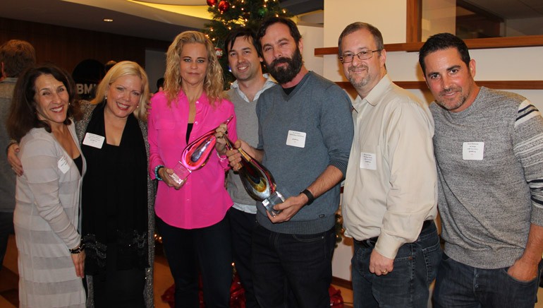 Pictured (L-R) at the 2015 AIMP holiday mixer held at BMI’s Los Angeles office are: Barbie Quinn, Executive Director AIMP and Associate Director BMI; Teri Nelson Carpenter, Vice President AIMP and CEO Reel Muzik Werks; recipient of the Individual Award for her support of songwriters and publishers in 2015, Dina LaPolt, LaPolt Law P.C.; recipients of the 2015 Indie Publisher of the Year award, Head of Operations SONGS Music Publishing Rob Guthrie and Head of Creative Services SONGS Music Publishing, Tom DaSavia; Michael Eames, President AIMP and President PEN Music Group; and David Weitzman, Secretary AIMP and Vice President, Business Development, ole.
