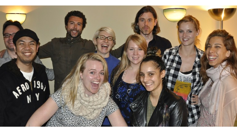 Pictured: Former members of the Song the Arts Academy Workshop pose for a photo.