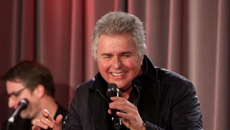 Steve Tyrell performs after the group discusses the process of songwriting.