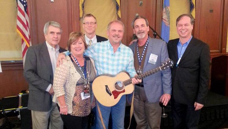 Pictured (L-R) after BMI songwriter Kent Blazy’s performance are: National Association of Broadcasters’ Executive Vice President John David, Team Radio’s Helen Coleman, OAB’s President and CEO, Vance Harrison, Kent Blazy, Team Radio’s Bill Coleman and BMI’s Rick Schrock.