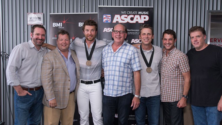 Pictured (L-R): Sony/ATV’s Josh VanValkenburg, BMI’s Bradley Collins, BMI singer/songwriter Brett Eldredge, Warner Music’s John Espositio, songwriter Scooter Carusoe, ASCAP’s Michael Martin, and Carnival Music’s Frank Liddell.