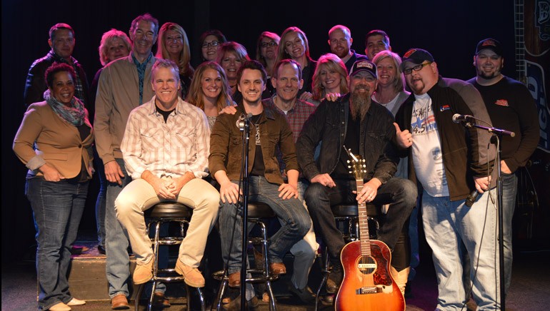 Pictured (L-R) before the show are: BMI songwriters Casey Beathard and Greg Bates, BMI’s Dan Spears and BMI songwriter Kendell Marvel with the Neuhoff Media staff.
